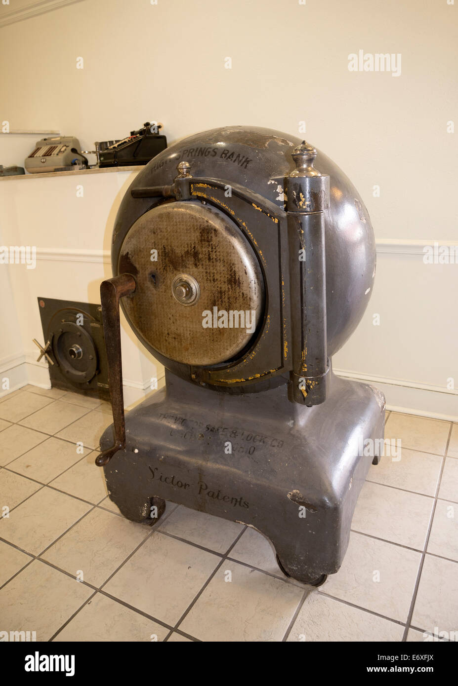 In the 1860’s to 1920’s “Cannonball Safes” were considered to be virtually “robbery Proof”. This one is on display in a bank. Stock Photo