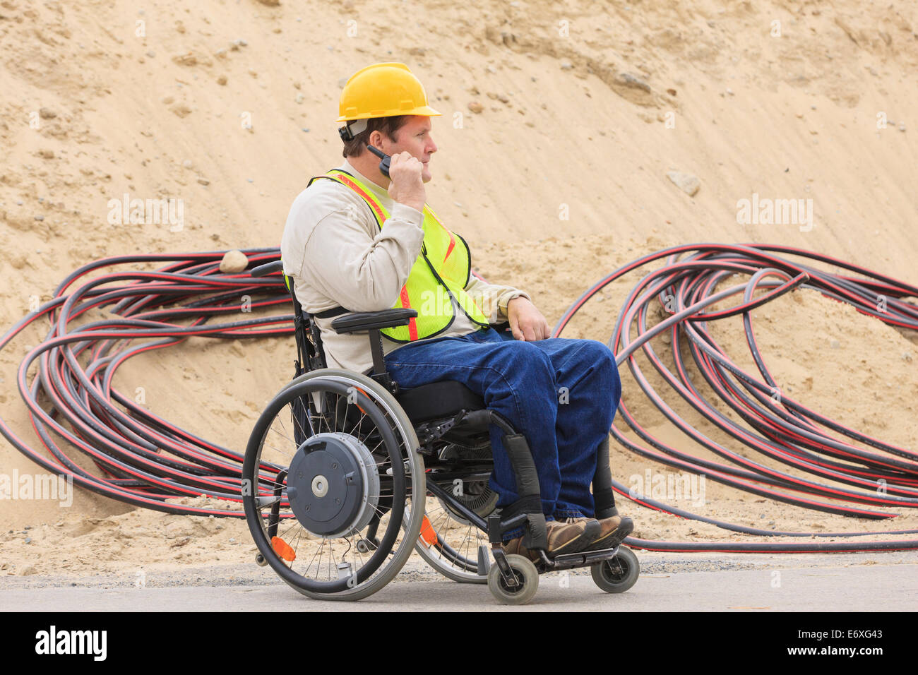 Cable Injury Construction supervisor with Spinal Cord Injury on walkie talkie with ...