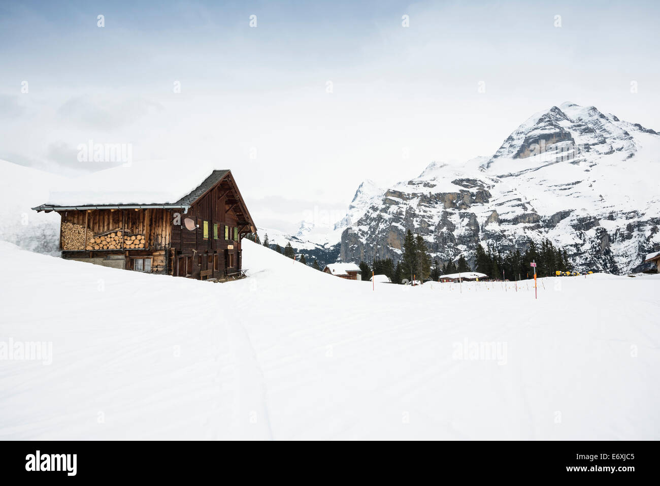 Alpine huts and mountain panorama at Gimmeln, Gimmeln, Muerren, canton of Bern, Switzerland Stock Photo