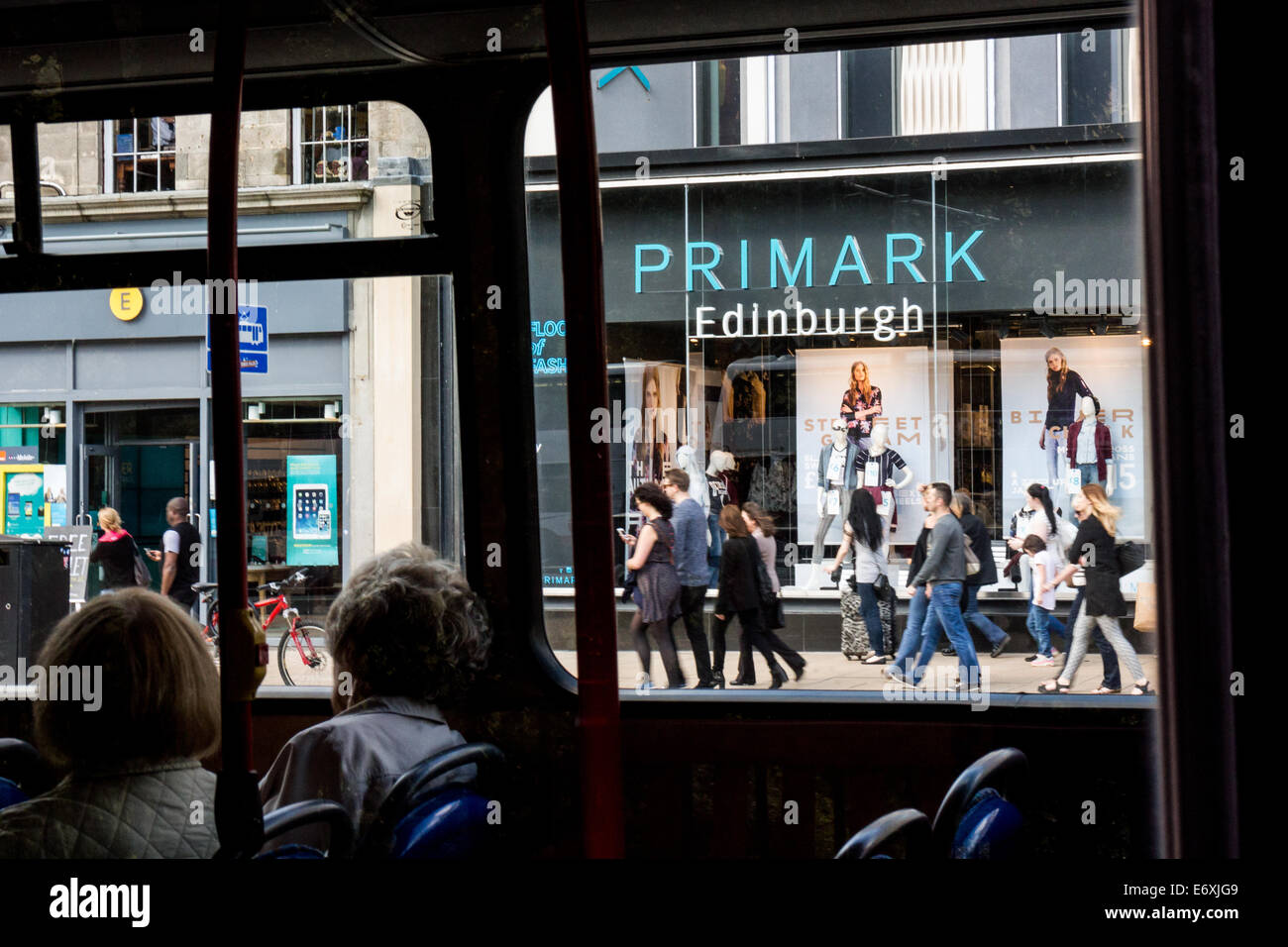 Primark clothing store viewed through a bus on Princes Street