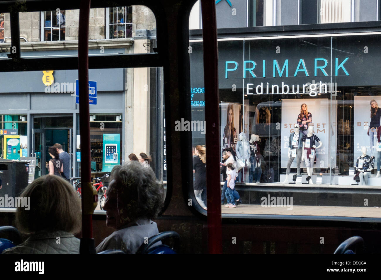 Primark clothing store viewed through a bus on Princes Street, Edinburgh Stock Photo