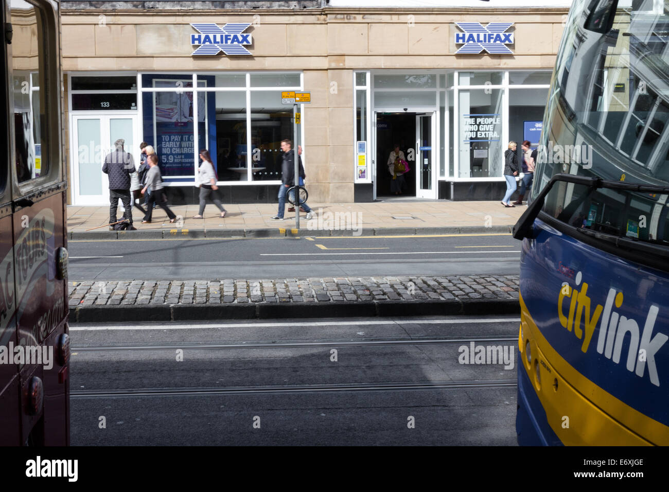 Buses and shoppers outside of the Halifax Building Society on Princes