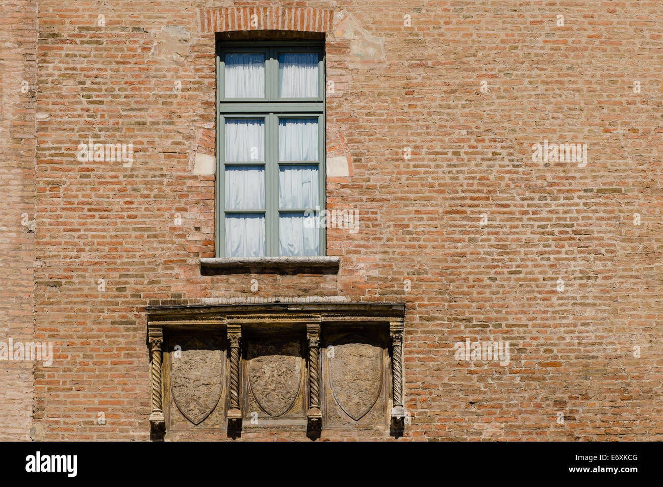 window of an old palace in Italy Stock Photo