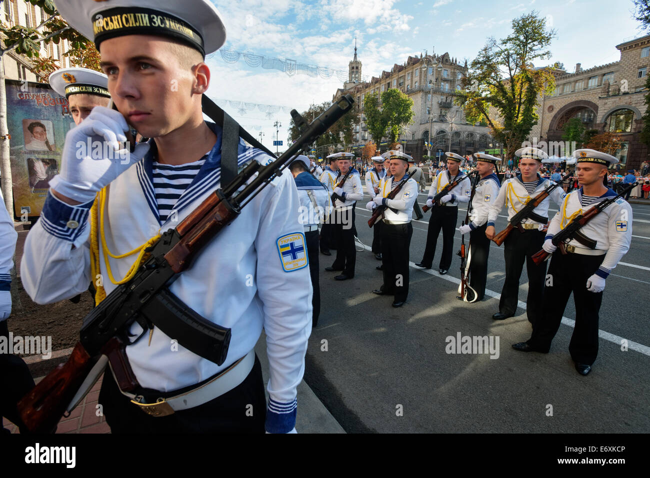 Navy cadet calling parents in free minutes before military parade on Independence Day of Ukraine in Kyiv Stock Photo