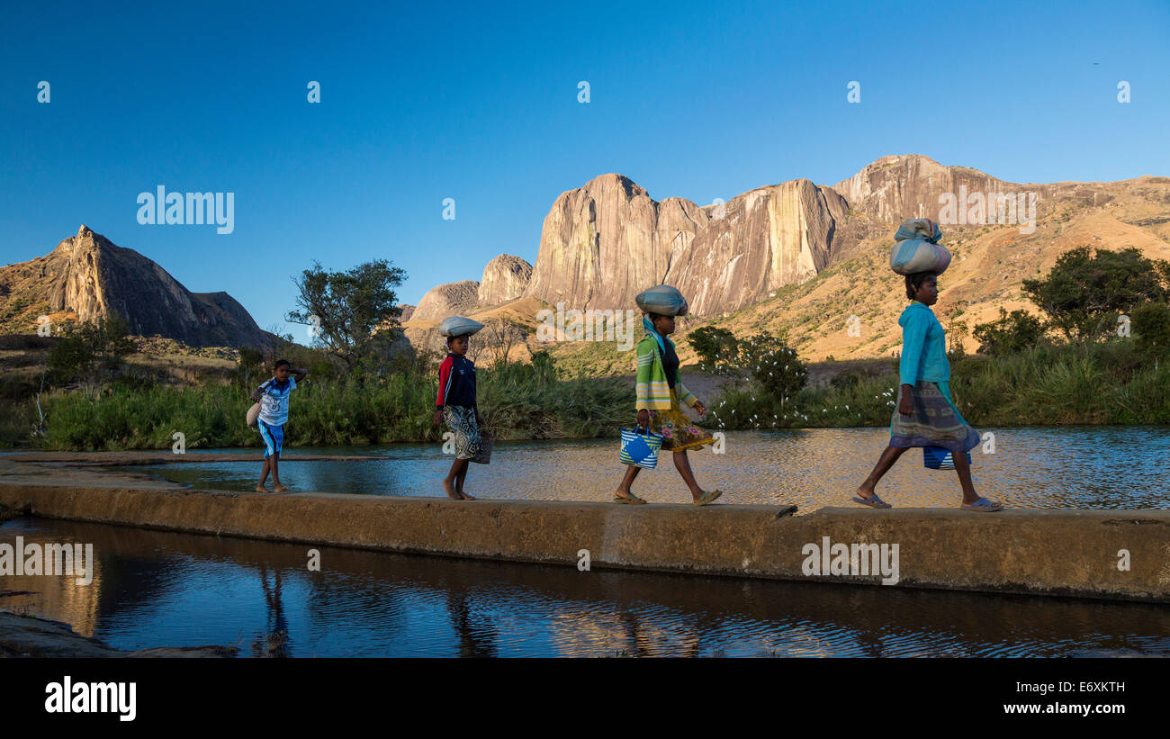 Madagascan girls in front of the Tsaranoro Massif, highlands, South Madagascar, Africa Stock Photo