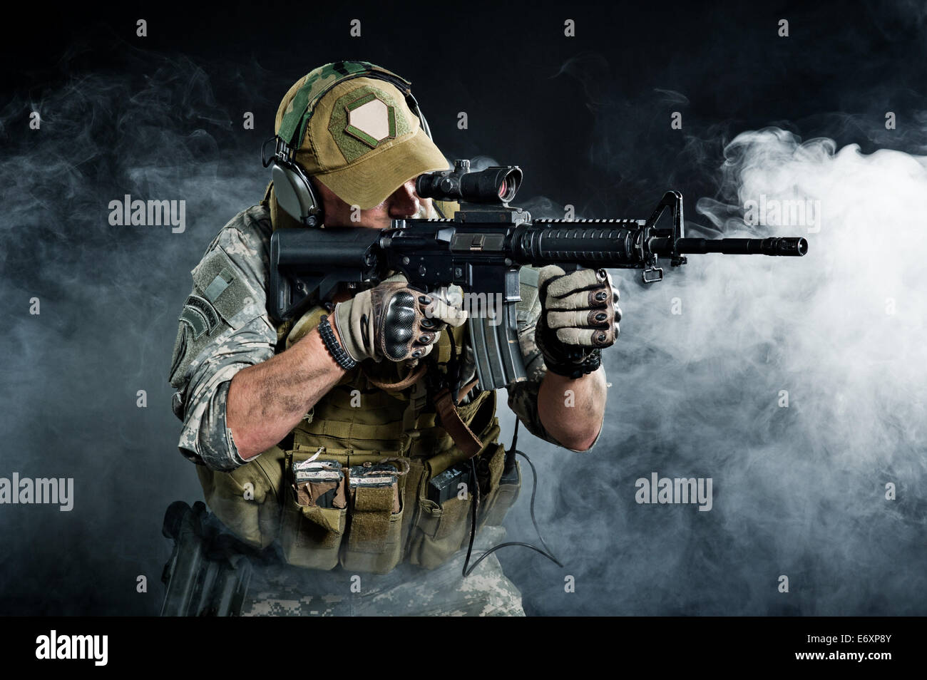 The attacking troops through the smoke after the explosion Stock Photo