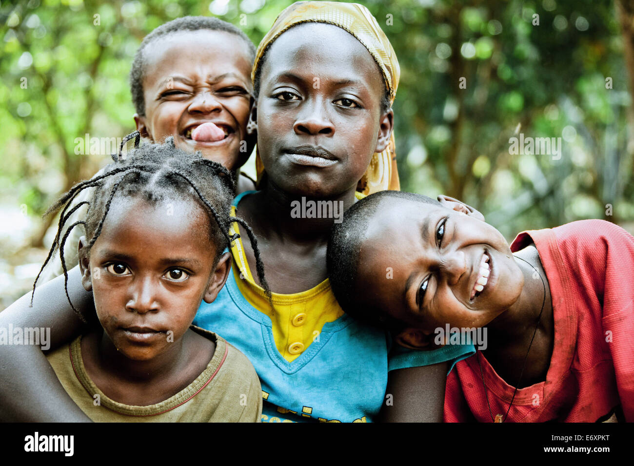 Three children and a young woman from the Ari tribe, Jinka, South Ethiopia, Africa Stock Photo