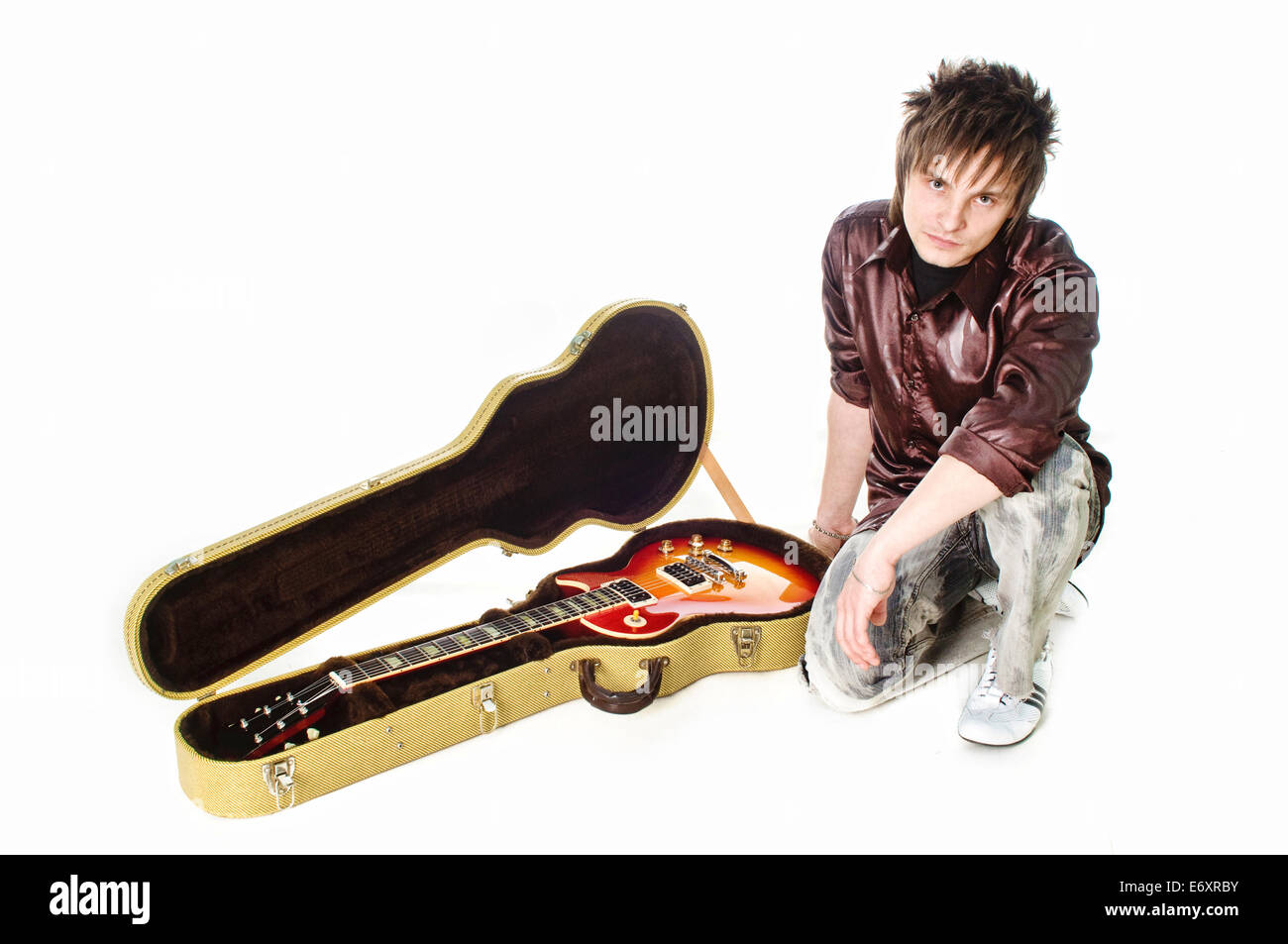 Rocker with his classic electric guitar Stock Photo Alamy