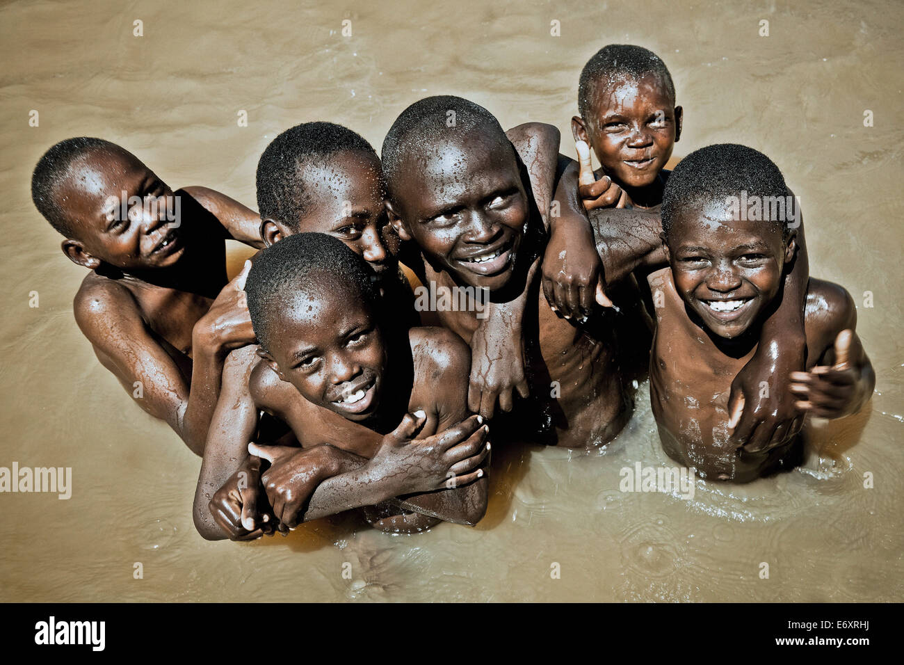 Children bathing in a water hole, Kenya, Africa Stock Photo - Alamy