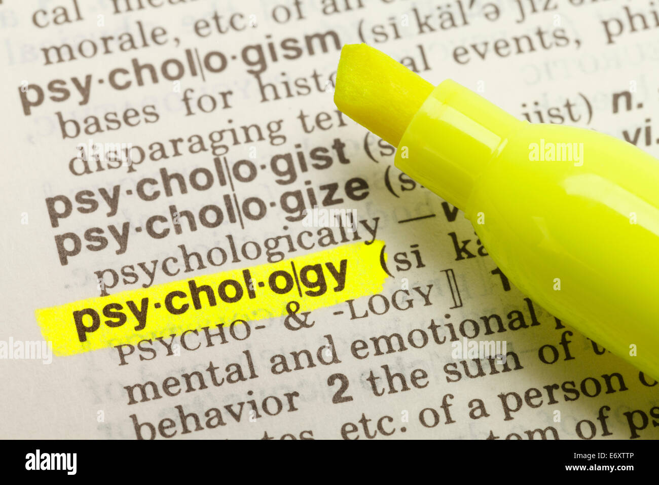 The Word Psychology Highlighted in Dictionary with Yellow Marker Highlighter Pen. Stock Photo