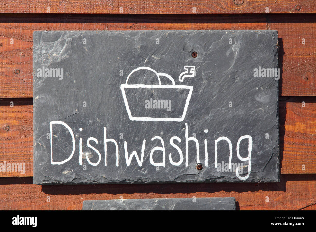 Dishwashing sign on slate in a campsite in Fife, Scotland Stock Photo