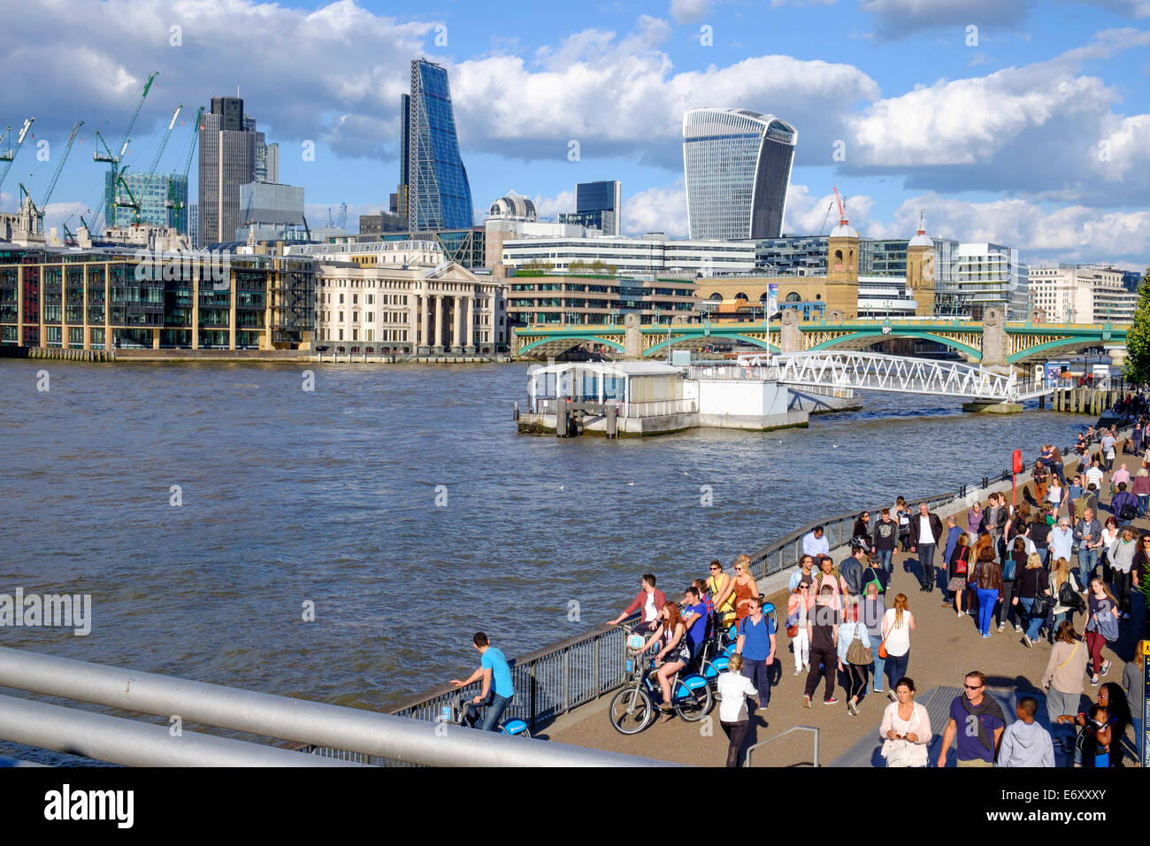 London, showing southwark bridge and construction cranes covering the