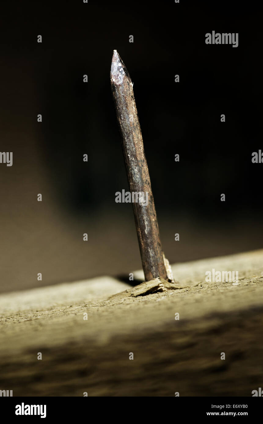 Nail Point Sticking Out From Wood Stock Photo Alamy