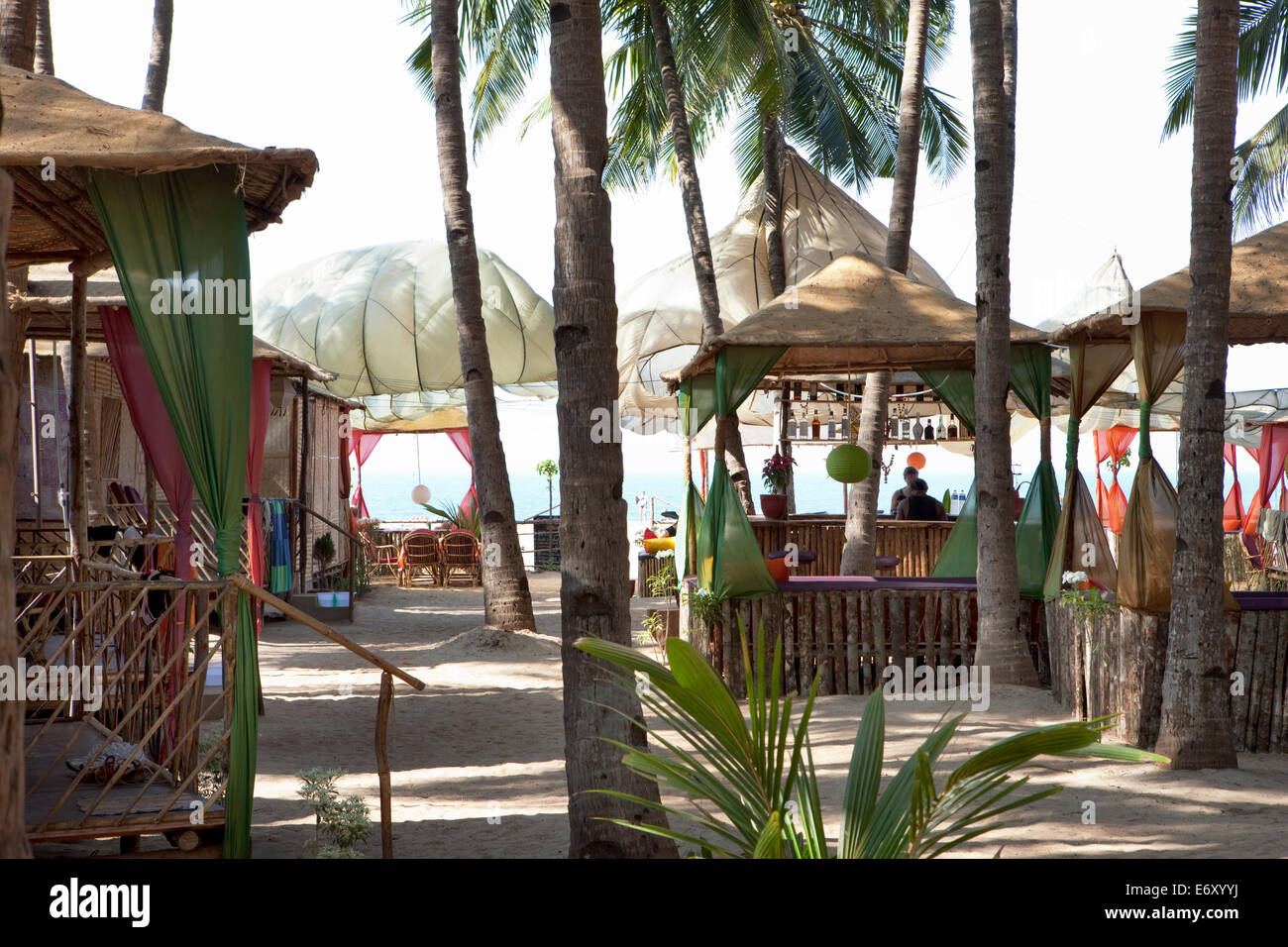 Beach resort with solar sails, bar and bungalows on the beach, Agonda, Goa, India Stock Photo