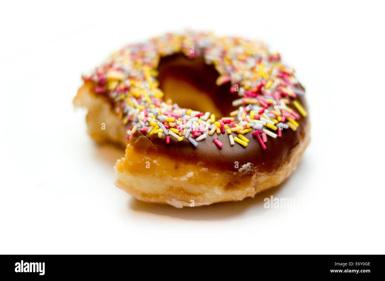 Bitten donut isolated on a white background Stock Photo