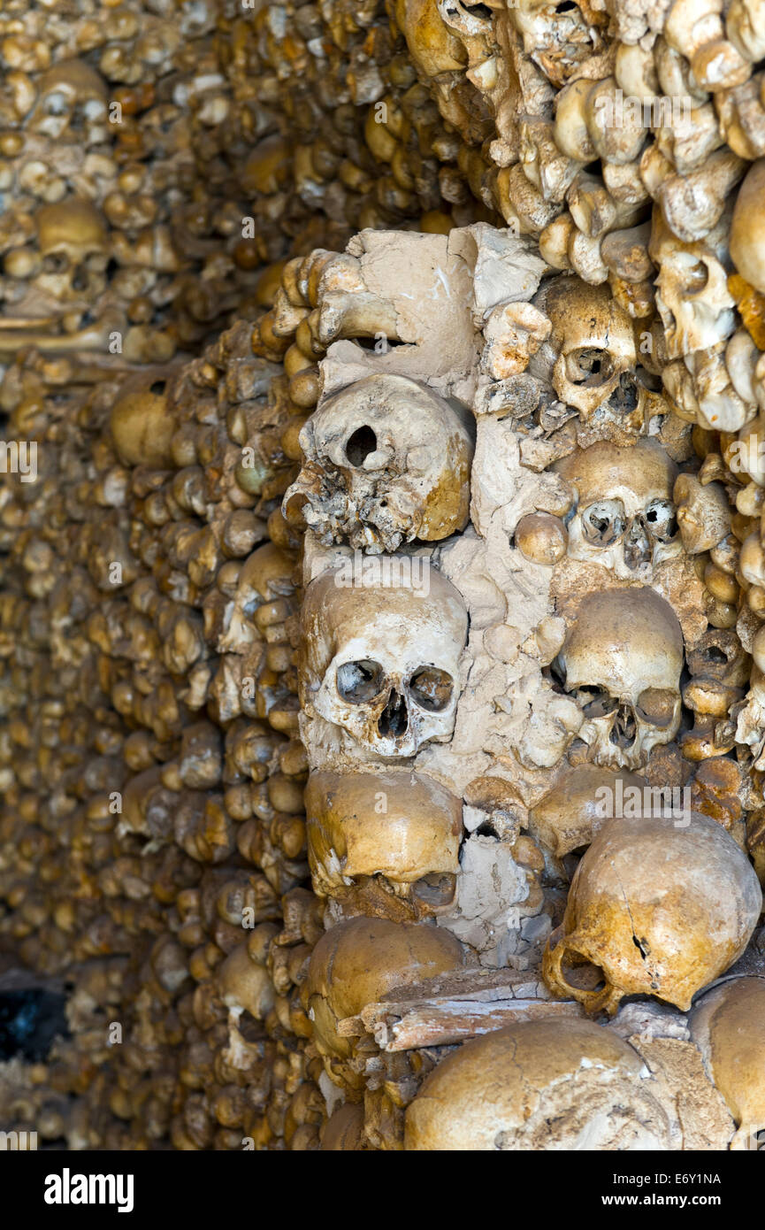 Human skulls on the walls of Chapel of the Deceased Alcantarilha Algarve Portugal Stock Photo