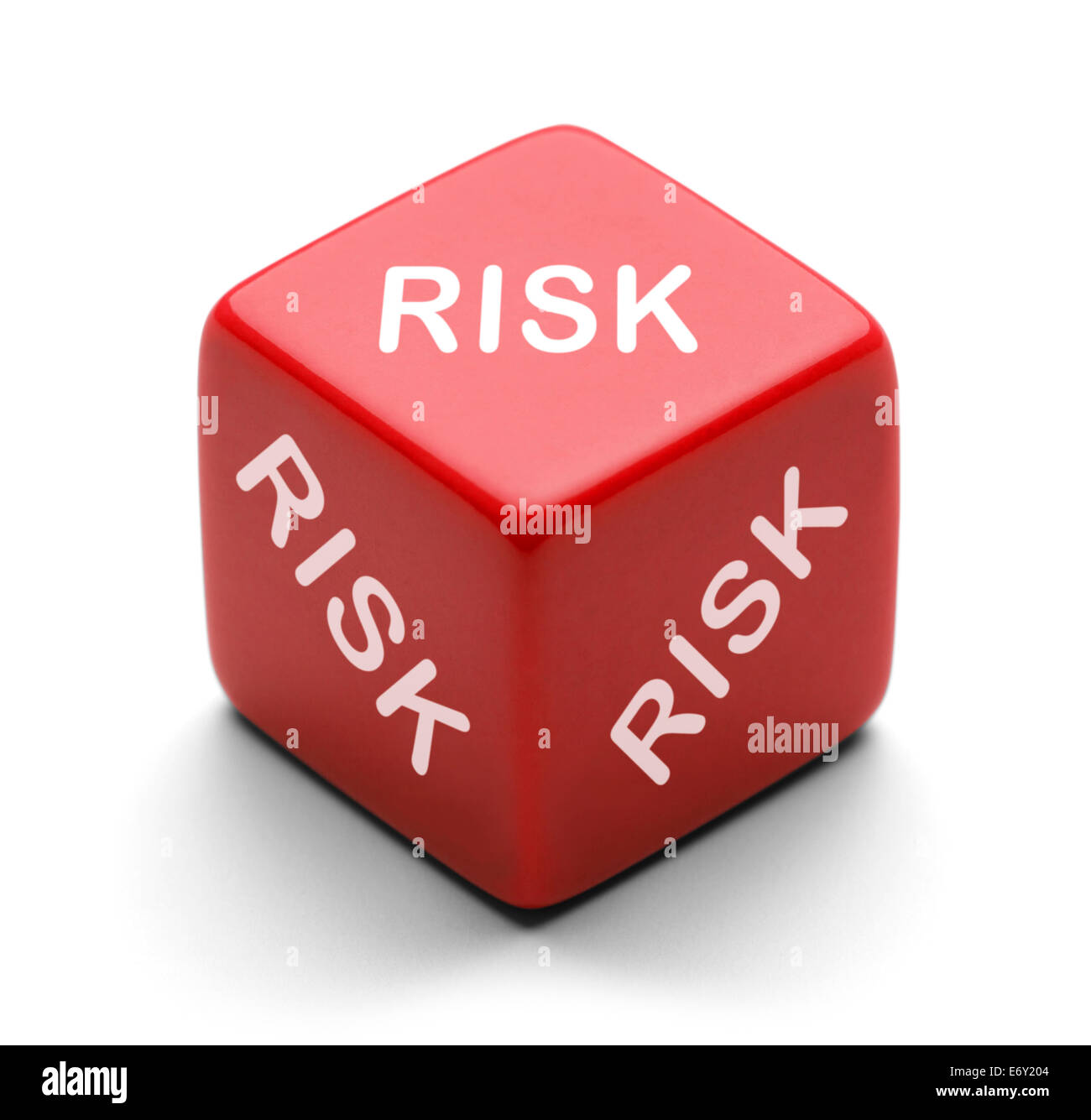 Red Dice with Risk on it Isolated on white background. Stock Photo