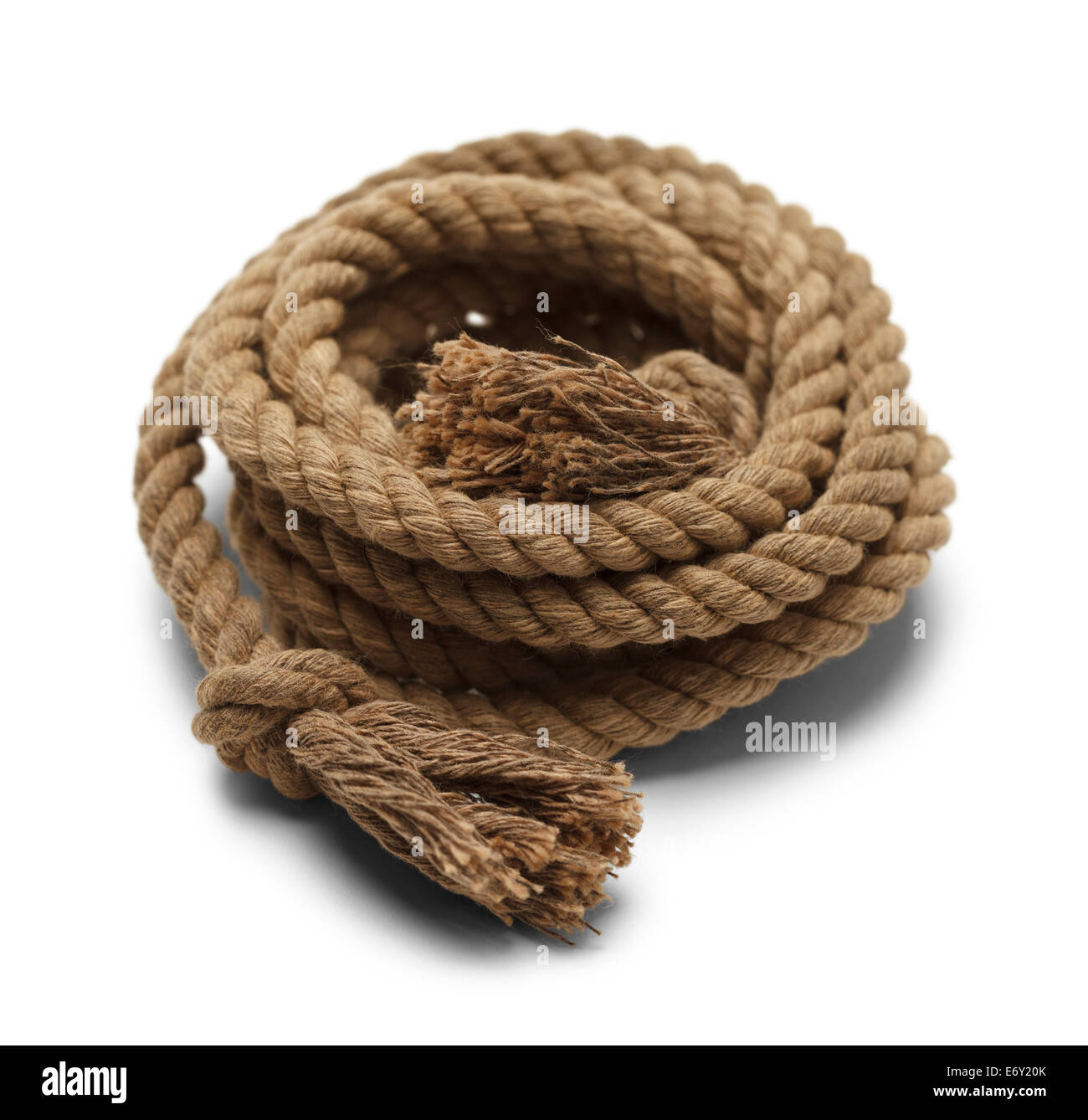 Rope Wound Up in a Pile Isolated on White Background. Stock Photo