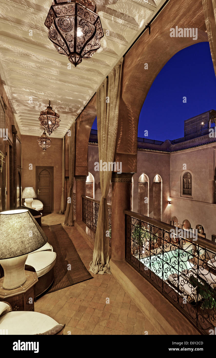 Balcony overlooking courtyard and pool, Riad Noir D'Ivoire, Marrakech, Morocco Stock Photo