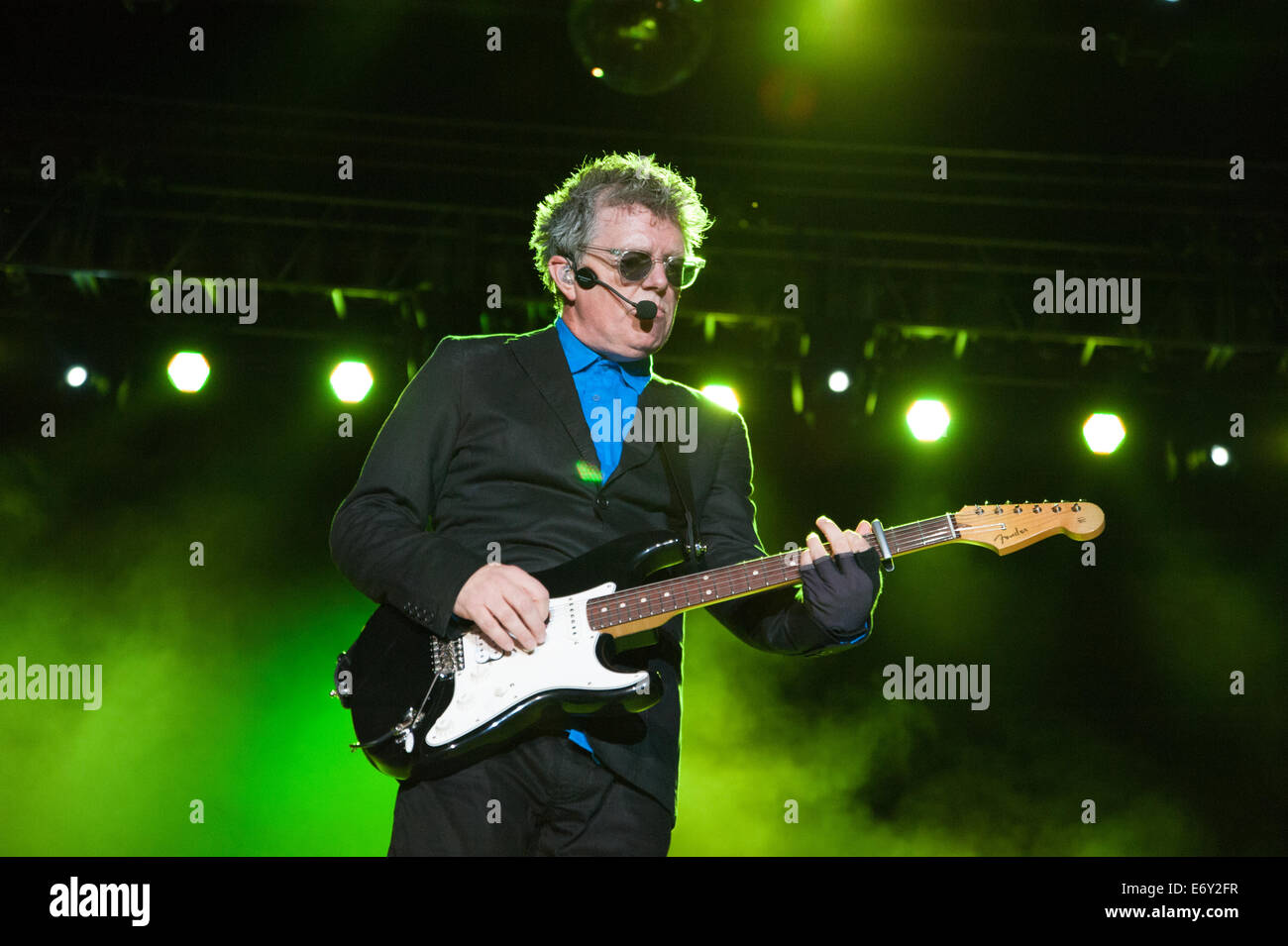 Musician Tom Bailey of Thompson Twins performs on stage in support of