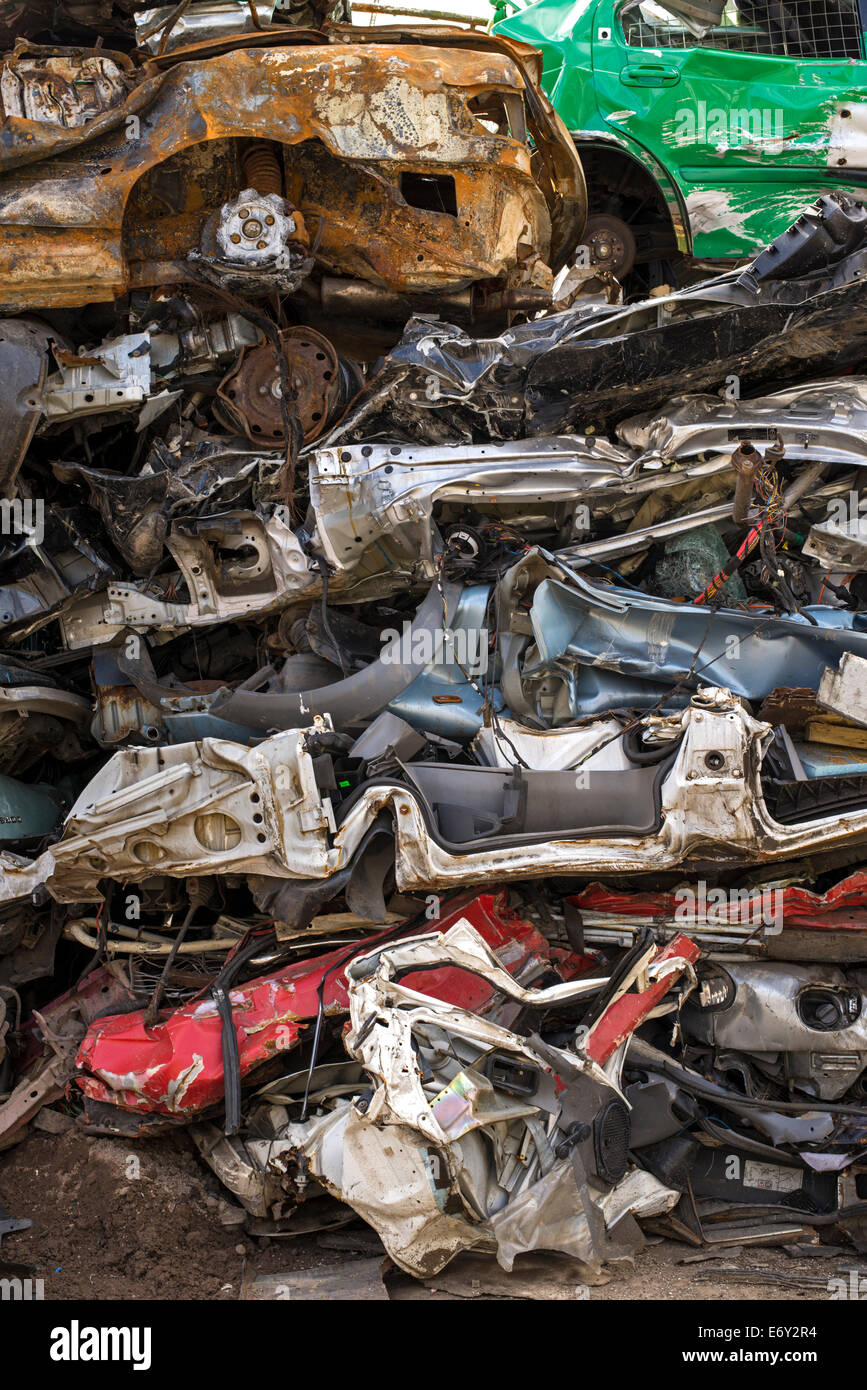 A pile of crushed cars in a scrapyard Stock Photo Alamy