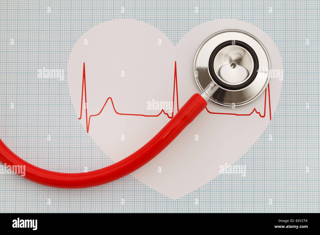 Stethoscope listing to a heart with a pulse. Stock Photo