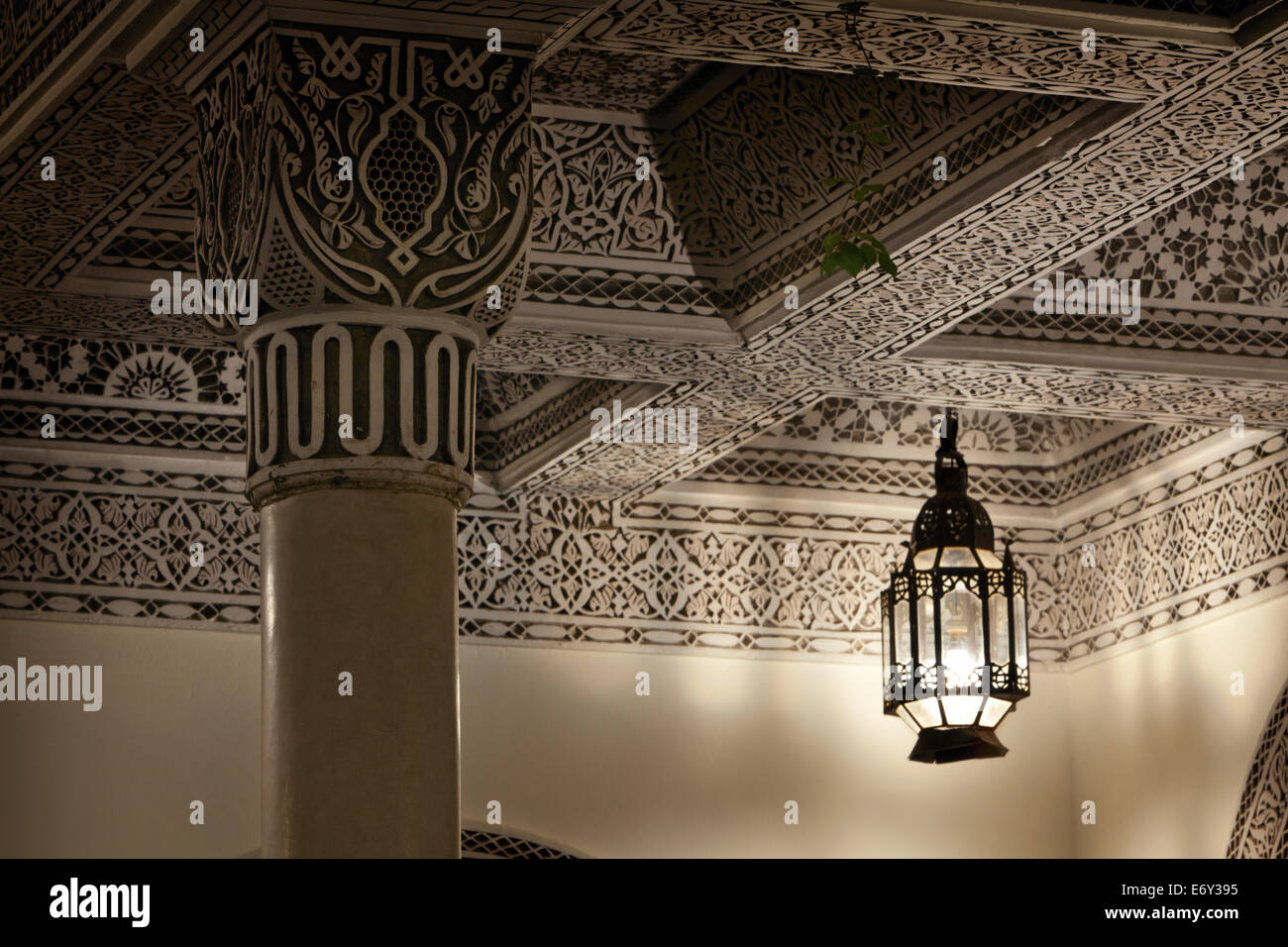 Moroccan Lamp casting light and shadows, Villa des Orangers, Marrakech, Morocco Stock Photo