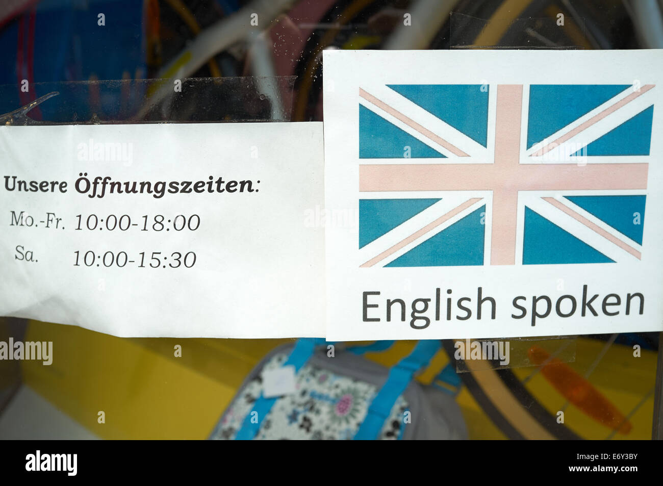 English spoken sign in the window of a German cycle shop Stock Photo