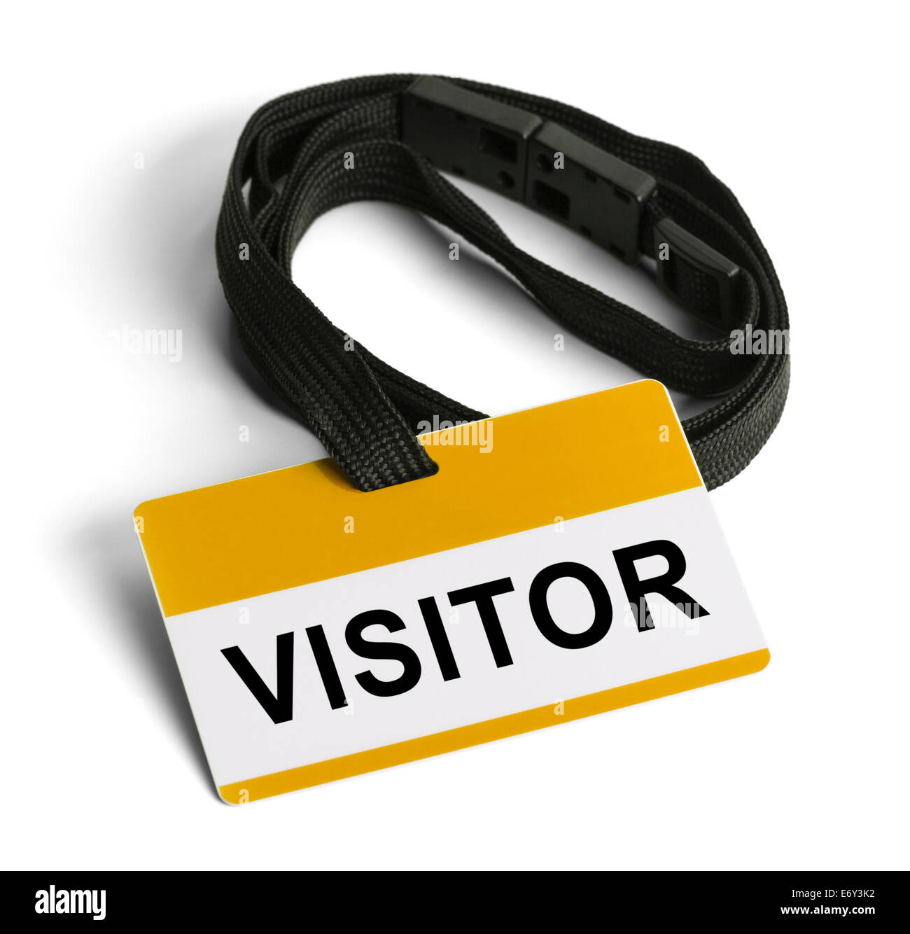 Visitor ID pass. Yellow and White Plastic Card. Isolated on White Background. Stock Photo