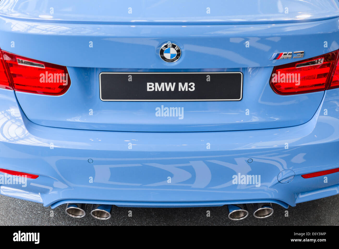 MUNICH, GERMANY - AUGUST 9, 2014: Rear view of new generation model BMW M3 - prestigious sports style car. Close-up details Stock Photo