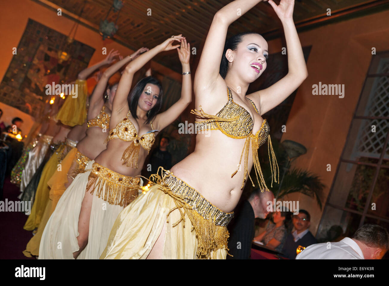 Belly dancers entertaining at Restaurant/Club Jad Mahal, Marrakech, Morocco Stock Photo