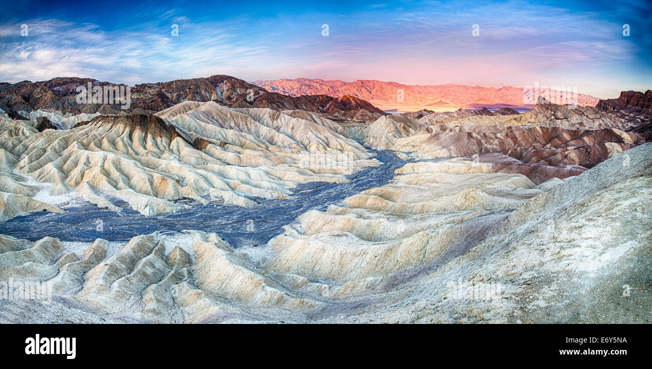 The sun rises over Zabriskie Point in Death Valley National Park, California, USA Stock Photo
