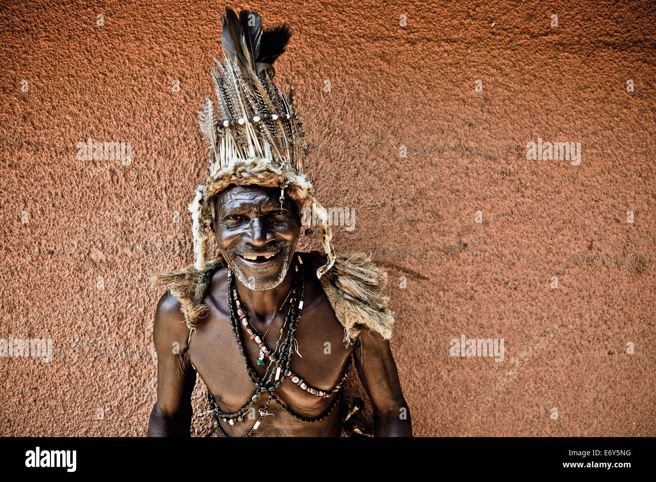 Old man with traditional outfit and headdress, Sambia, Africa Stock Photo