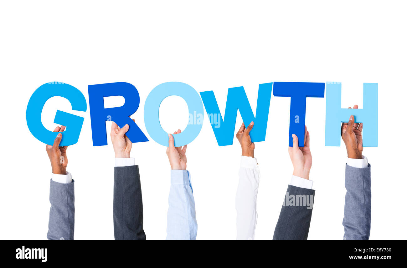 Group of Hands Holding Letters Forming the Word 'GROWTH' Stock Photo