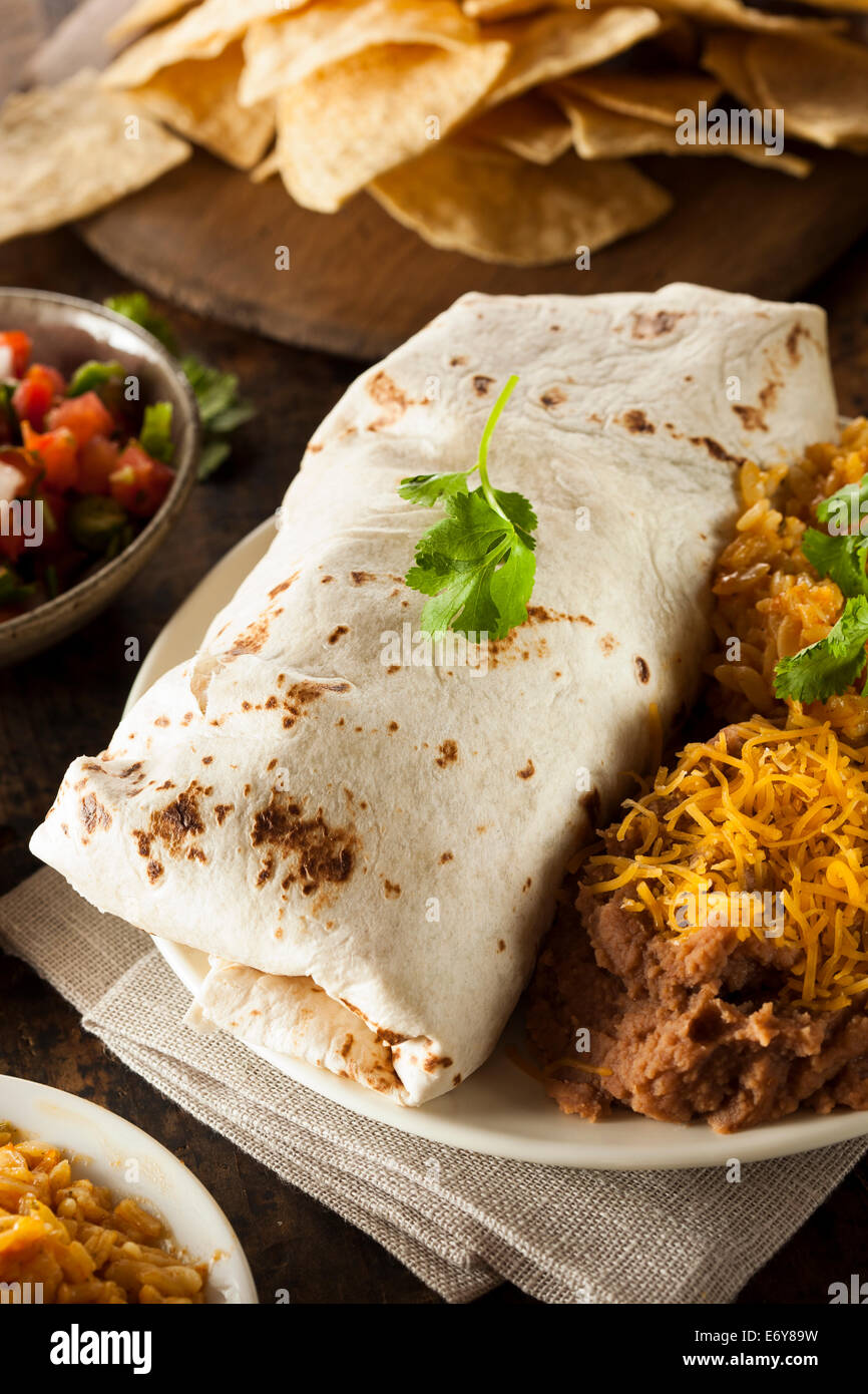 Homemade Giant Beef Burrito with Lettuce Salsa and Rice Stock Photo Alamy