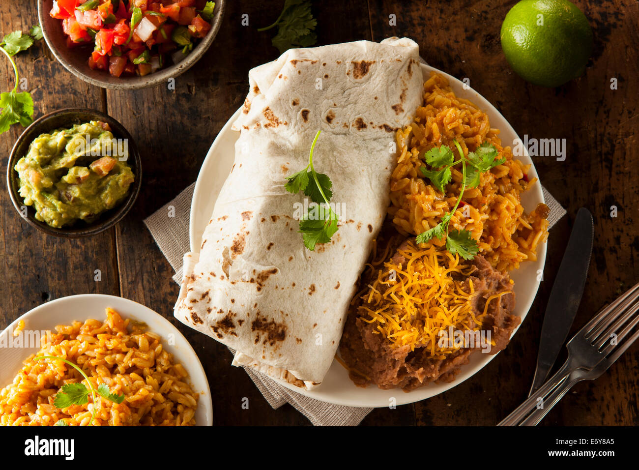 Homemade Giant Beef Burrito with Lettuce Salsa and Rice Stock Photo Alamy