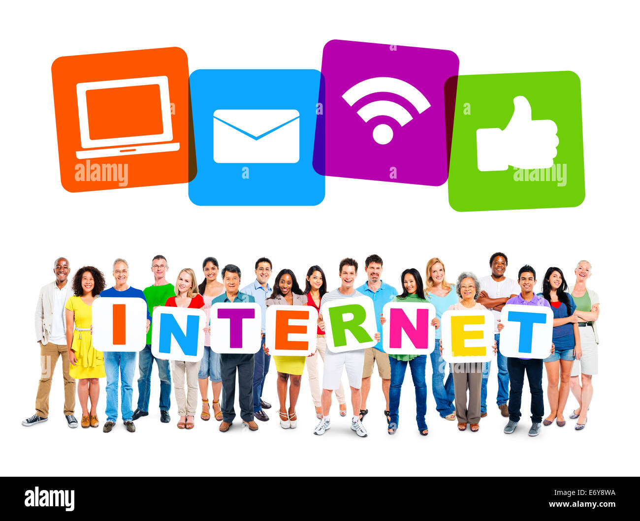 Multi-Ethnic Group Of People Holding Alphabet To Form Internet And Internet Themed Images Above Stock Photo