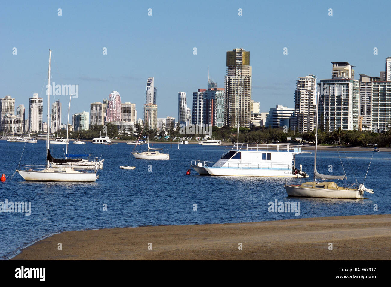 Boats moored in the Broadwater with high rise buildings in the background. Gold Coast Australia Stock Photo