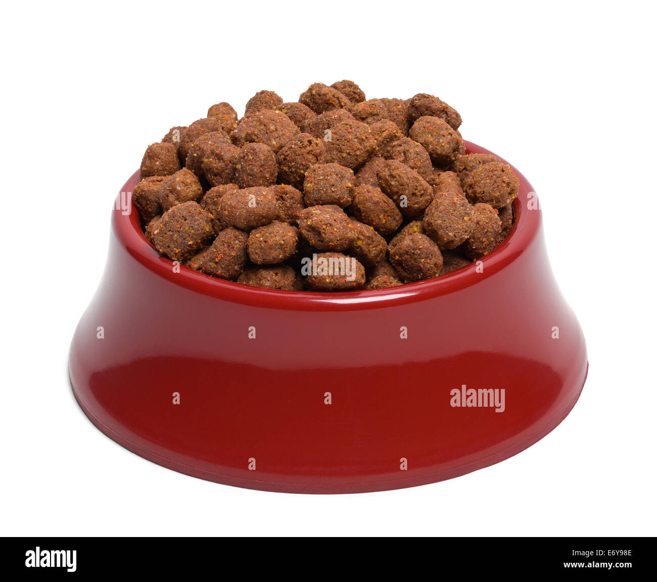 Red Bowl of Dog Food Isolated on White Background. Stock Photo