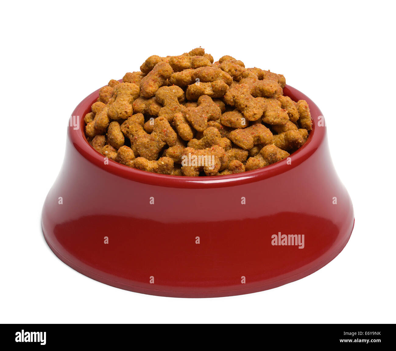 Red Bowl of Dog Food Isolated on White Background. Stock Photo