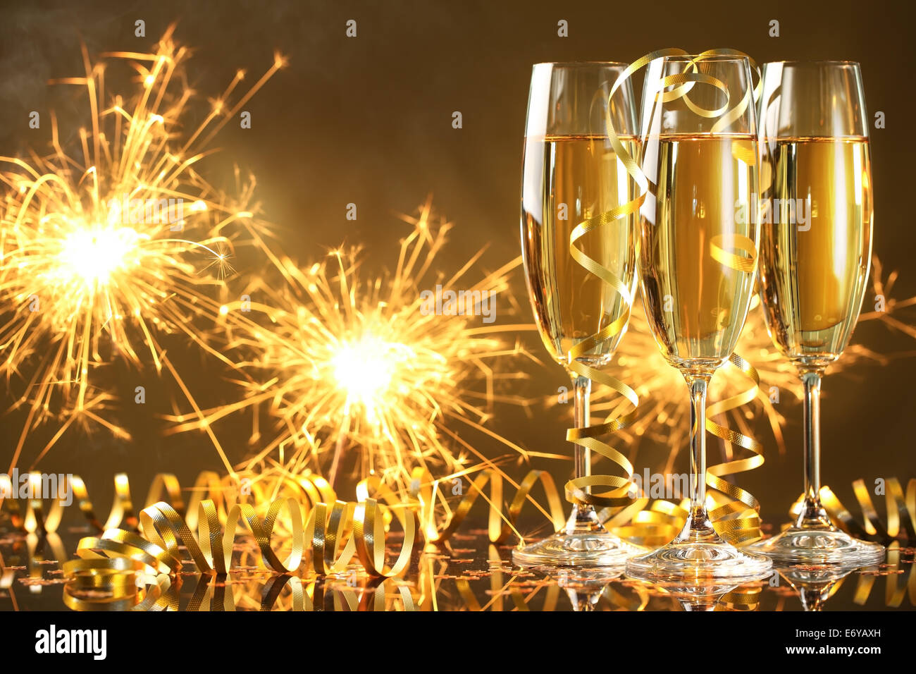 Champagne and fireworks,new year celebration. Stock Photo