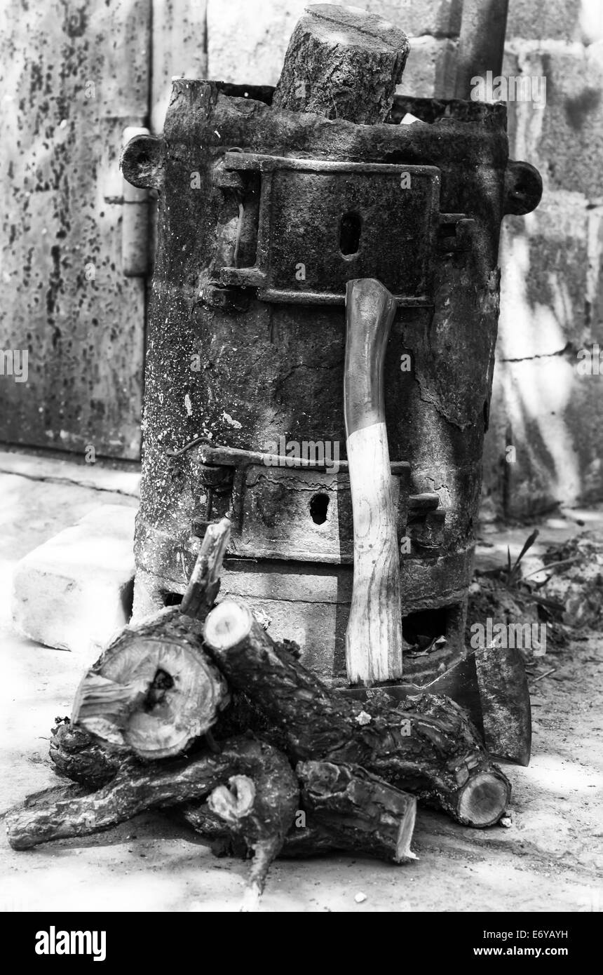 old rusty metal furnace stove Stock Photo
