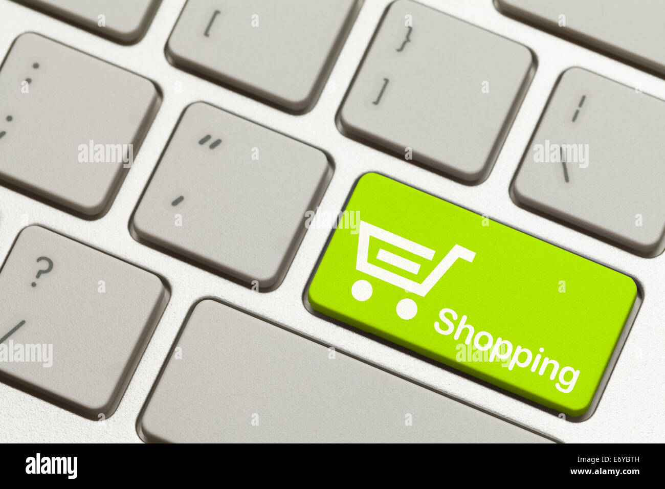 Close Up of Green Shopping Key Button on Keyboard. Stock Photo