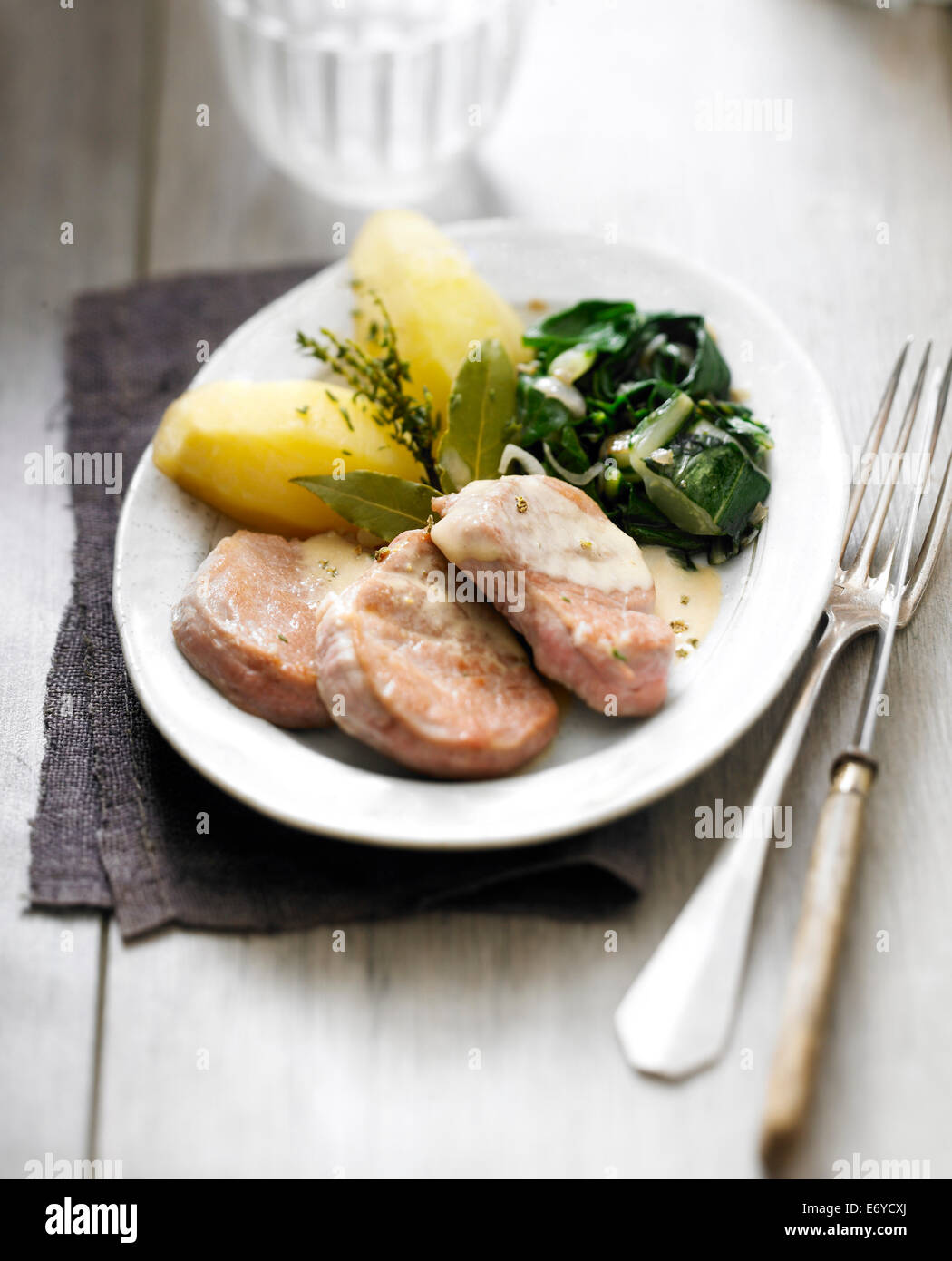 Pork Filet mignon with green pepper sauce,sauteed beets and boiled potatoes Stock Photo
