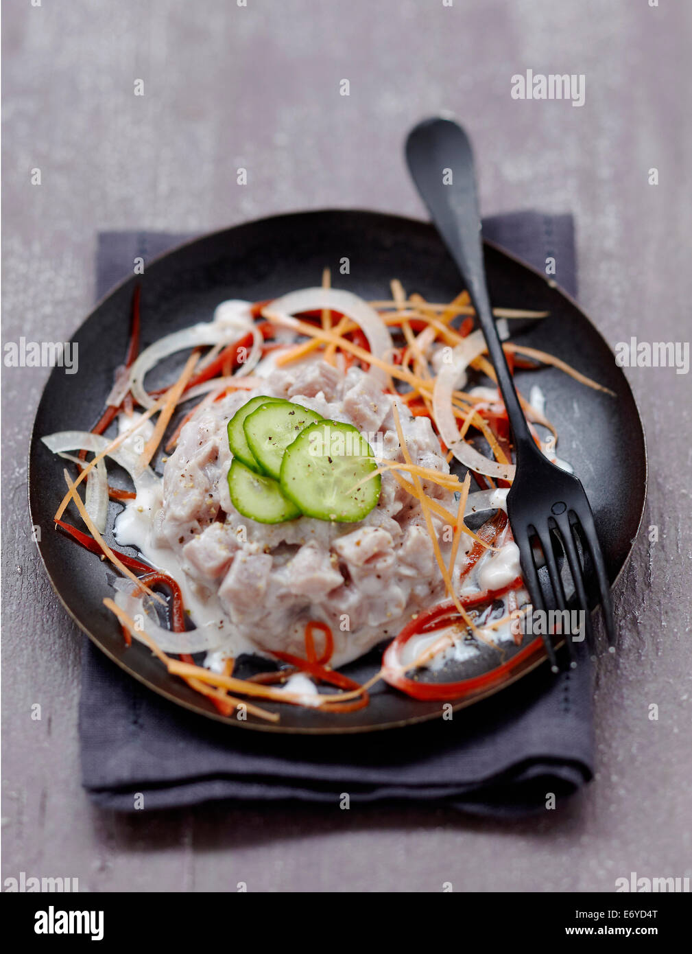Raw fish in coconut milk Stock Photo - Alamy
