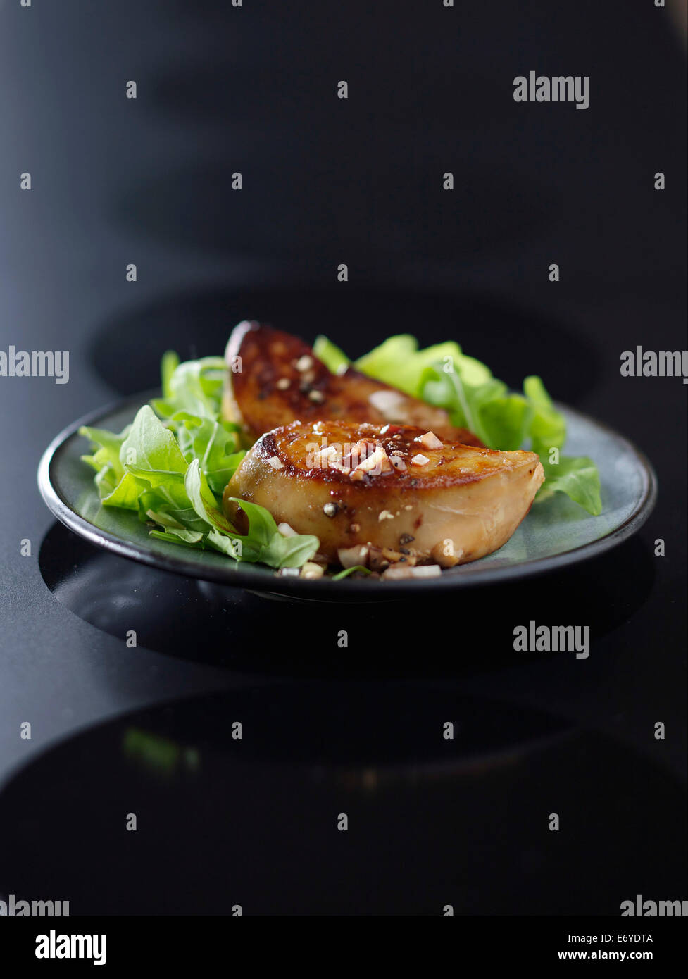 Rocket lettuce with foie gras Stock Photo