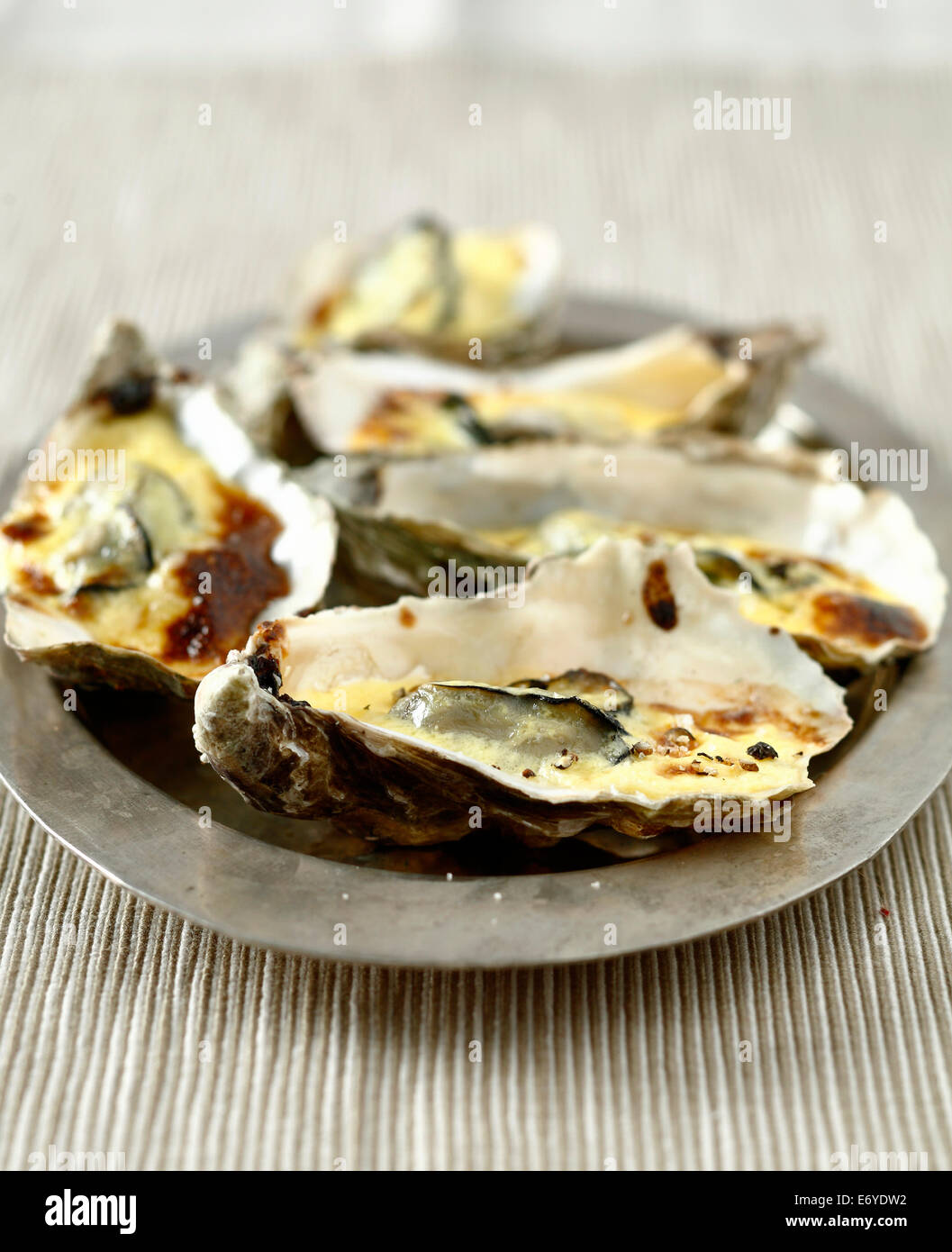 Hot oysters with Champagne sauce Stock Photo Alamy