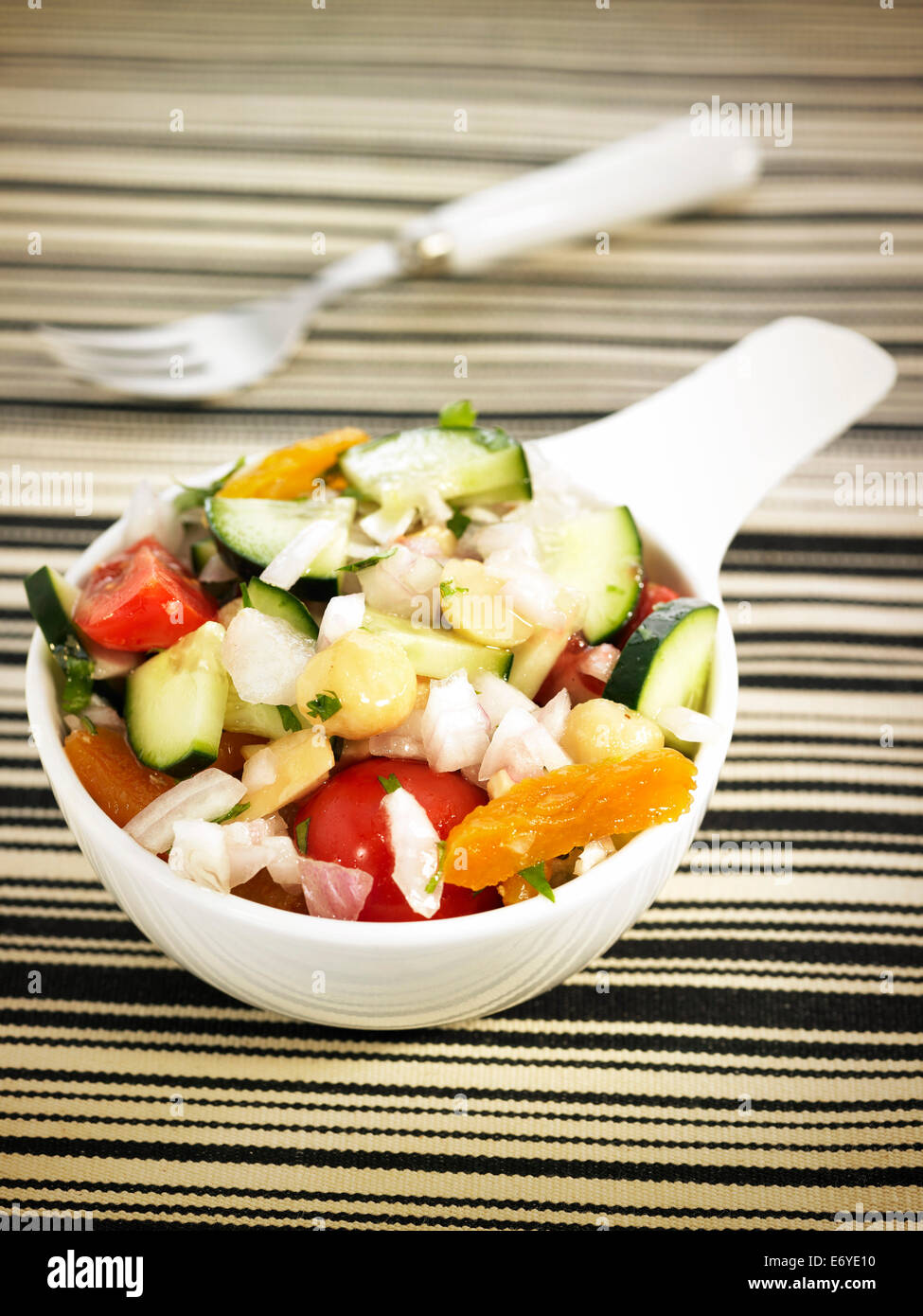 Vegetable and dried apricot salad Stock Photo