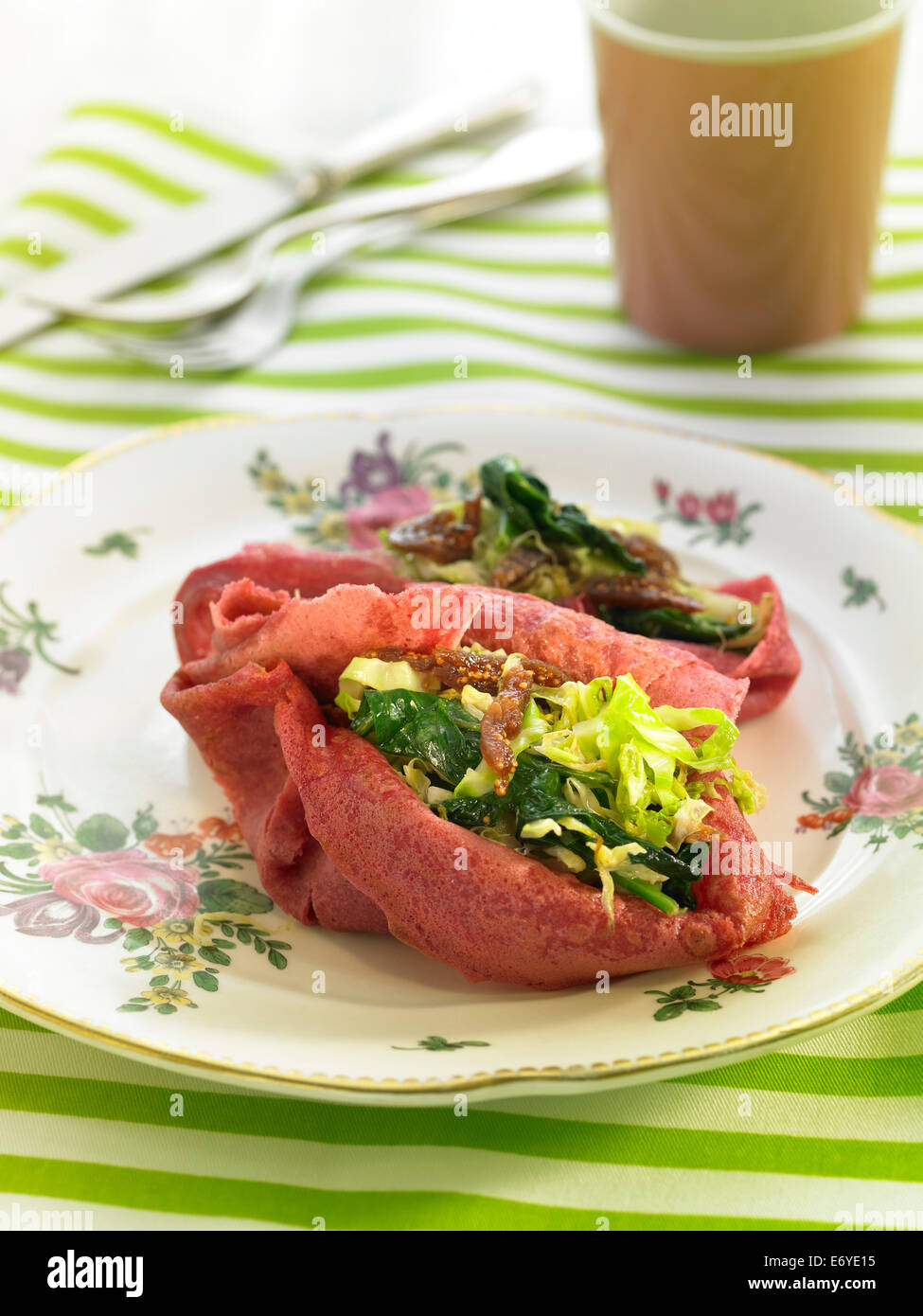 Beetroot crepe with vegetables Stock Photo