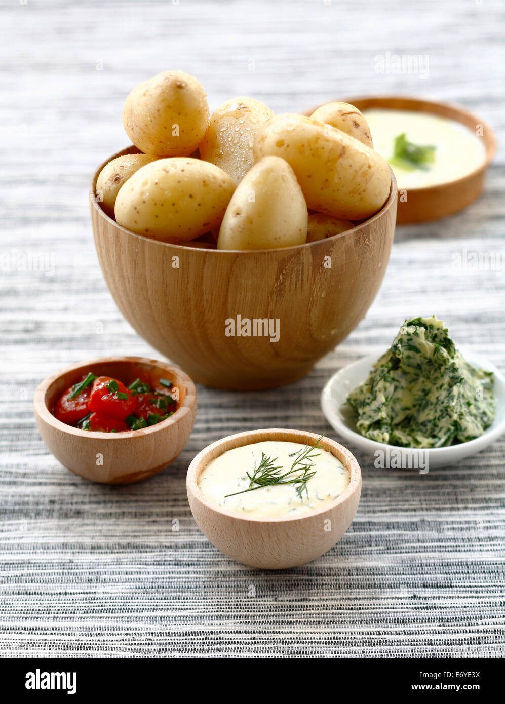 Steamed potatoes with a variety of sauces Stock Photo